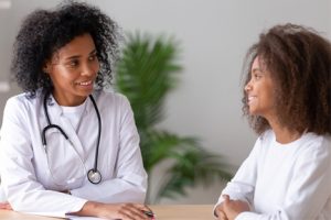 Young Girl Smiling About Her Female Health Provider in Youngstown Ohio